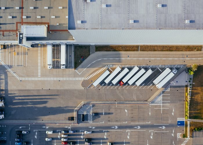 production, facility, logistic, distribution center, transit, truck, transport, top view, industrial, semi, aerial view, heavy, depot, germany, warehouse, container truck, shipping containers, storehouse, road, loading bay, factory, unloading, distribute, unload, europe, aerial photography, production, logistic, truck, truck, warehouse, warehouse, warehouse, warehouse, warehouse